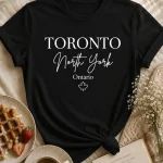 North York Toronto black t-shirt close-up - maple leaf and script detail