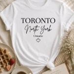 White Toronto North York Ontario white t-shirt flat lay - printed in North York