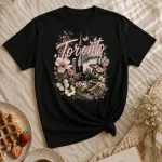 Black Toronto Spring cherry blossom tee flat lay - floral CN Tower design printed in Toronto