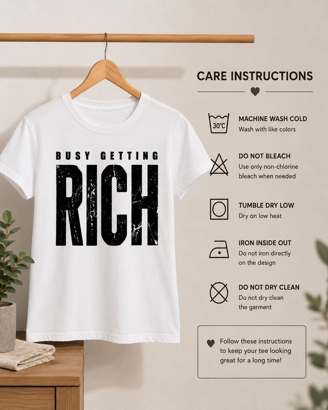 Busy Getting Rich tee care instructions - wash cold, do not bleach, tumble dry low