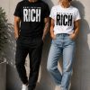 Busy Getting Rich tee in black and white worn as a pair - unisex statement tee Canada
