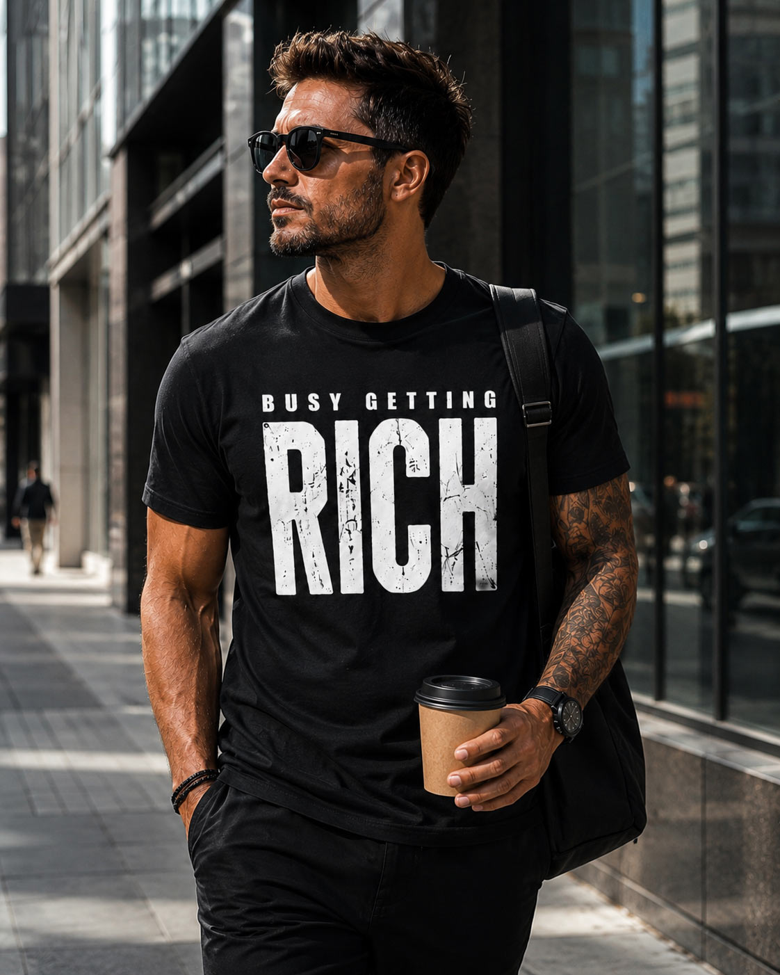 busy-getting-rich-tshirt-man-black-street Man wearing black Busy Getting Rich tee on the street - entrepreneur tee Toronto