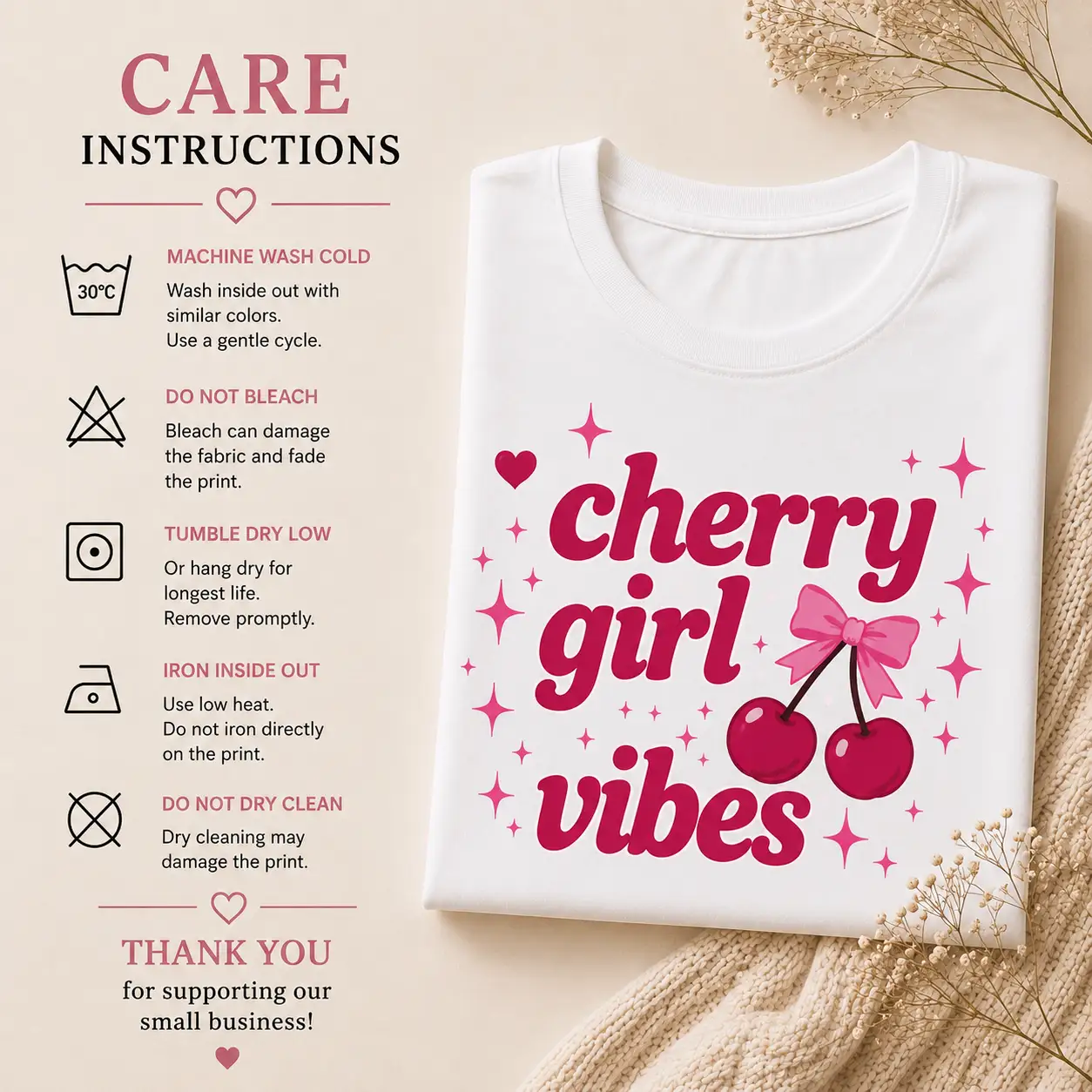 Cherry Girl Vibes print close-up - pink script, bow and glossy cherries detail care instructions