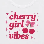 Cherry Girl Vibes print close-up - pink script, bow and glossy cherries detail