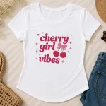 White Cherry Girl Vibes fitted tee flat lay - soft girl aesthetic top by PrintMyVibe