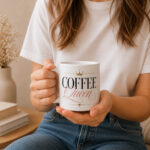 coffee-queen-mug-model-drinking Coffee Queen Mug — 11oz Ceramic Mug with Crown - being used - PrintMyVibe Toronto