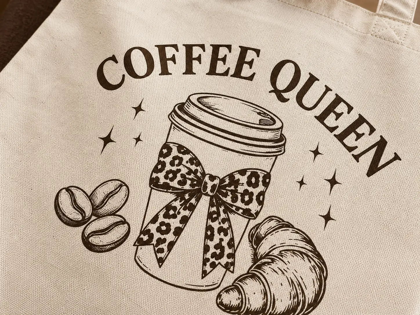 coffee-queen-tote-bag-mockup-02 Coffee Queen canvas tote close-up - vintage coffee cup and croissant detail