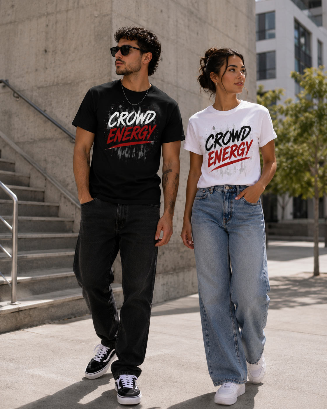 Couple in Crowd Energy tees walking downtown - unisex street tee pressed in Toronto