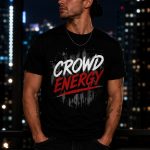 Man wearing black Crowd Energy tee at night in the city - street graphic tee Toronto