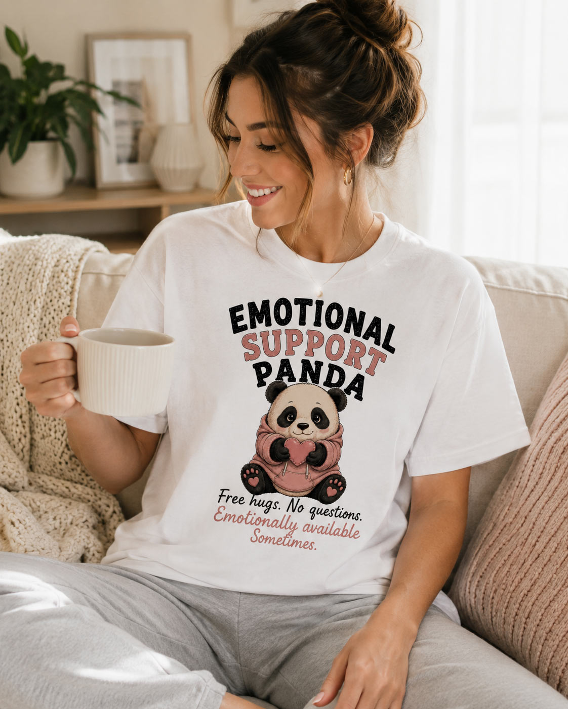 Woman in Emotional Support Panda tee holding a mug - cozy funny tee GTA