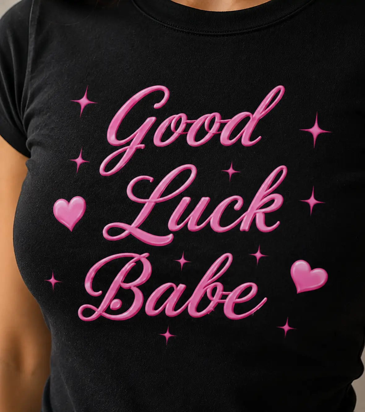 Good Luck Babe print close-up on black tee - pink script and hearts detail