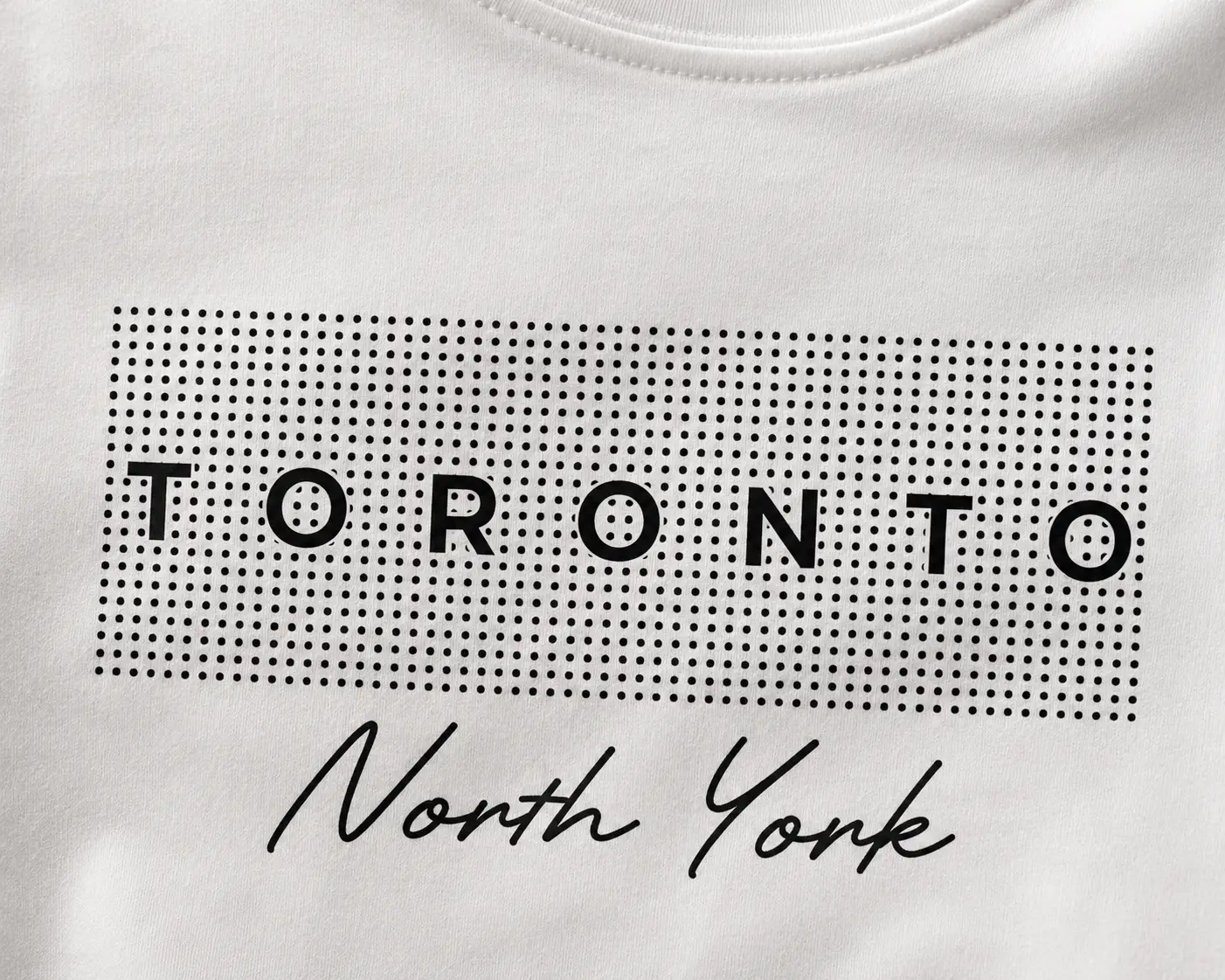 Toronto North York print close-up - houndstooth block and script detail