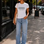 Woman wearing white Toronto North York fitted tee - local pride top Canada