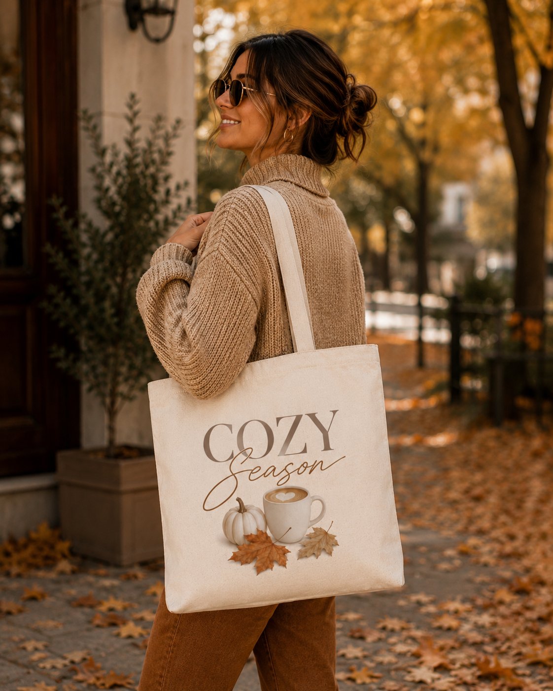 cozy-season-tote-bag-model-shoulder Woman carrying the Cozy Season tote over her shoulder in autumn - fall canvas tote Toronto