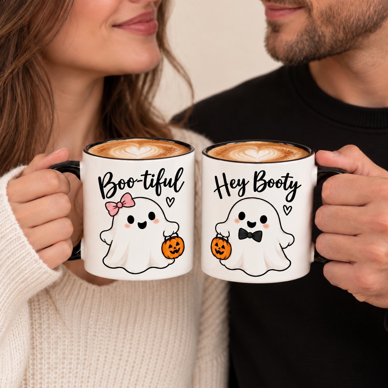 Couple drinking from the Boo-tiful and Hey Booty Halloween mug set - latte art closeup