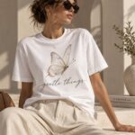 Gentle Things butterfly t-shirt close portrait - sepia butterfly and script lettering