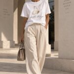 Gentle Things butterfly t-shirt worn with wide cream trousers - neutral aesthetic tee Toronto