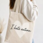 I Hate Autumn tote bag worn over the shoulder - ironic heart canvas tote Canada
