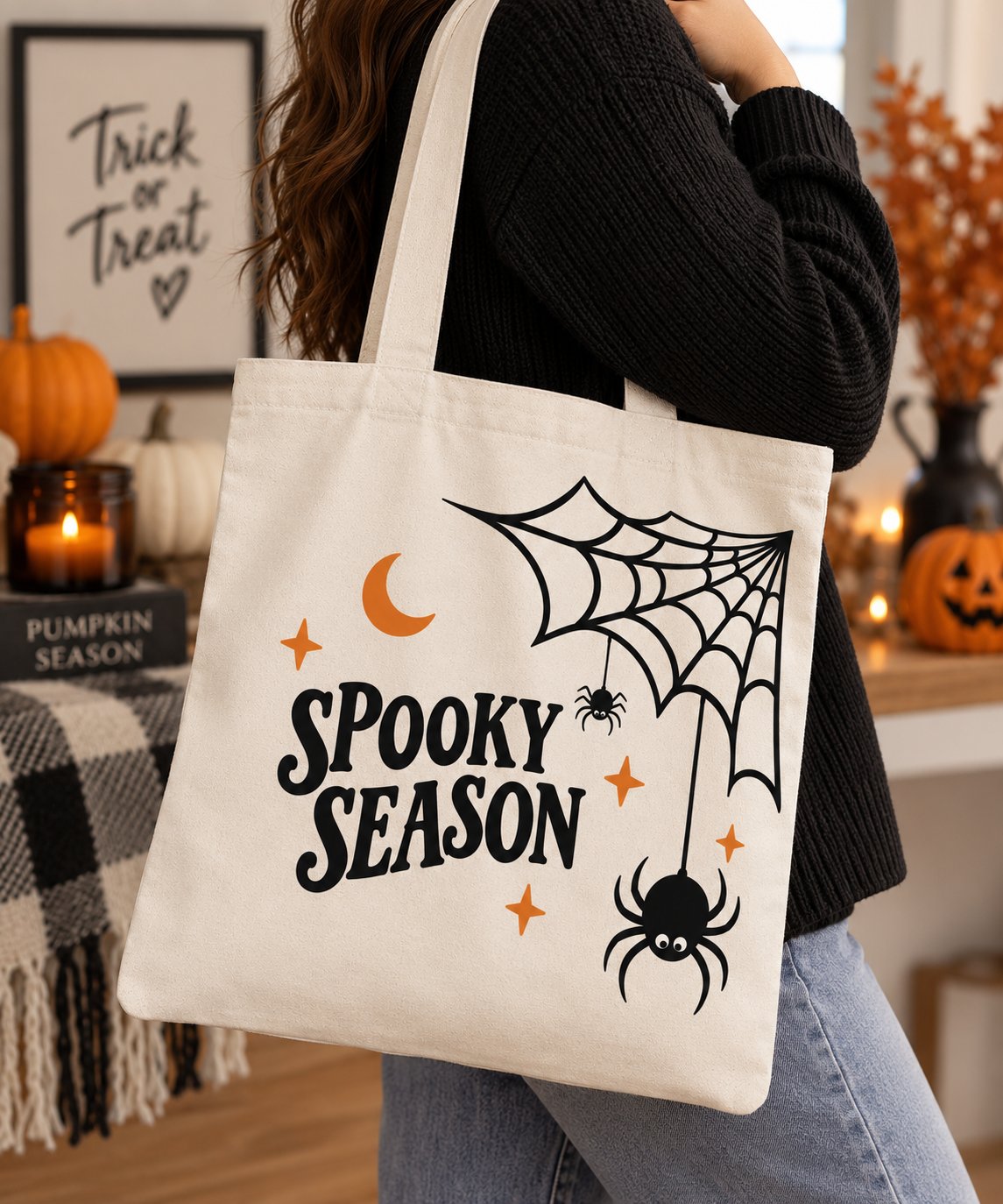 Woman carrying the Spooky Season Halloween canvas tote - cobweb and spider design - PrintMyVibe Toronto