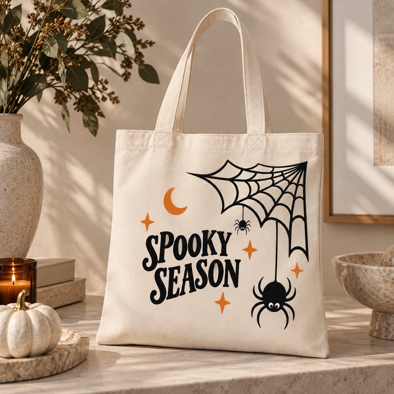Spooky Season canvas tote styled with white pumpkins and candles - Halloween decor Toronto