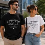 Couple wearing the Toronto North York tees in black and white - matching the 6ix skyline shirts Toronto