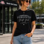 Woman wearing the Toronto North York black t-shirt outside North York Centre - the 6ix skyline tee - PrintMyVibe Toronto