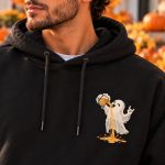 Close-up of the small chest print - cartoon ghost raising a beer that pours straight through it