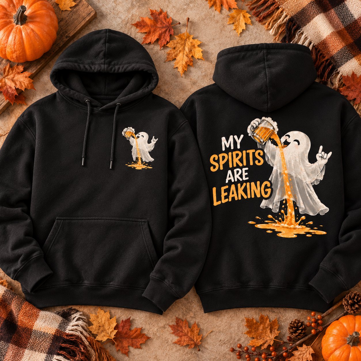 Black My Spirits Are Leaking hoodie flat lay with pumpkins and autumn leaves - front and back