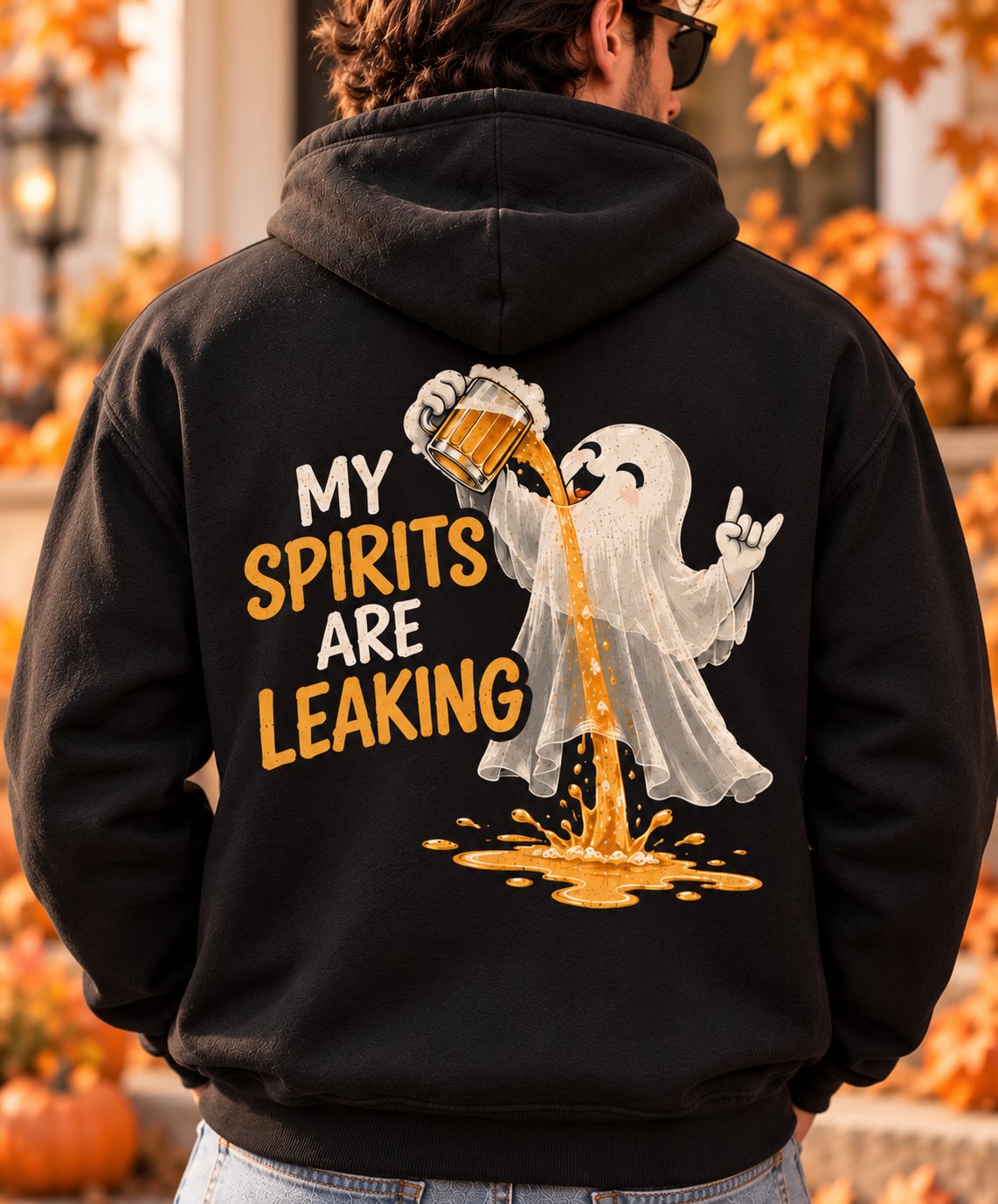 Man wearing the black My Spirits Are Leaking hoodie, back view - funny ghost beer Halloween hoodie - PrintMyVibe Toronto