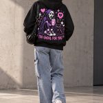 Back of the Too Ghoul For You hoodie worn with jeans outdoors - pink ghost back print hoodie